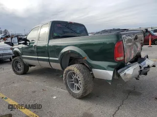 1999 Ford F-250 XL with VIN 1FTNX21F1XEC66642, listed as a Copart auction lot 43719795 with 243,637 mi miles and Salvage title. Bid and sale history available at DreamBid. Image 2.
