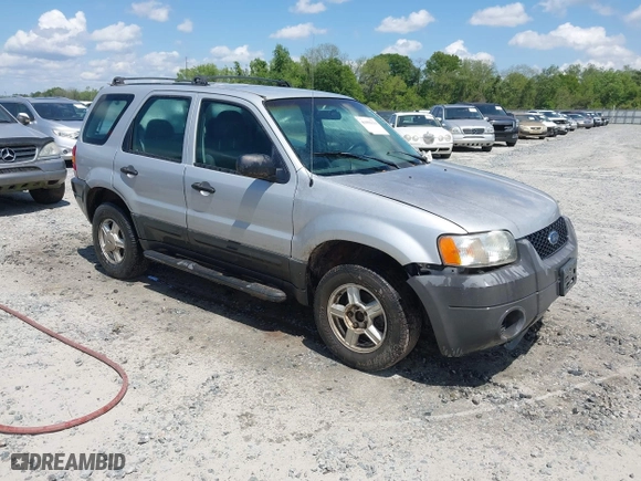 2003 Ford Escape XLS Popular with VIN 1FMYU02183KC05213, listed as a IAAI auction lot 41955134 with 305,524 mi miles. Bid and sale history available at carsss.com. Image 1.