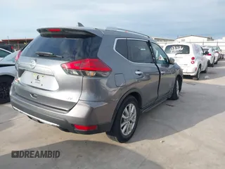 2017 Nissan Rogue S with VIN KNMAT2MT3HP519624, listed as a IAAI auction lot 42178427 with 128,387 mi miles and . Bid and sale history available at DreamBid. Image 4.
