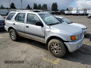 1998 Isuzu Rodeo S z VIN 4S2CK58W9W4302907, wystawiony jako Copart lot #48997335 z przebiegiem 162 858 mil mil oraz Szkoda całkowita • Salvage title. Historia ofert i sprzedaży dostępna na DreamBid. Obrazek 4.