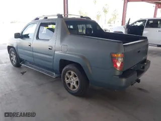 2006 Honda Ridgeline RTL with VIN 2HJYK16516H511027, listed as a IAAI auction lot 42052394 with 354,106 mi miles. Bid and sale history available at carsss.com. Image 3.