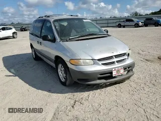 2000 Dodge Caravan SE with VIN 2B4GP45G0YR525310, listed as a Copart auction lot 69596394 with 299,957 mi miles and Salvage Title. Bid and sale history available at carsss.com. Image 11.