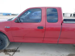 2003 Ford F-150 XL with VIN 1FTRX17213NB65093, listed as a IAAI auction lot 41568065 with 286,293 mi miles. Bid and sale history available at carsss.com. Image 14.