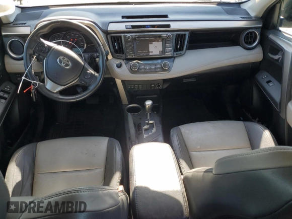 2014 Toyota RAV4 Limited with VIN 2T3DFREV4EW163570, listed as a Copart auction lot 58873125 with 124,324 mi miles and Salvage title. Bid and sale history available at DreamBid. Image 8.
