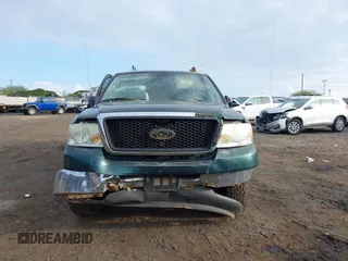 2007 Ford F-150 STX with VIN 1FTRX12W57FB35590, listed as a IAAI auction lot 41518237 with 242,321 mi miles and . Bid and sale history available at DreamBid. Image 12.