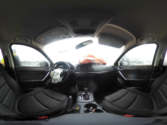 2015 Mazda CX-5 Touring with VIN JM3KE2CY4F0435563, listed as a IAAI auction lot 41311988 with 187,183 mi miles. Bid and sale history available at carsss.com. Image 18.