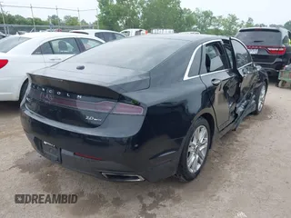 2016 Lincoln MKZ z VIN 3LN6L2G9XGR601231, wystawiony jako IAAI lot #42699222 z przebiegiem 107 081 mil mil oraz . Historia ofert i sprzedaży dostępna na DreamBid. Obrazek 4.