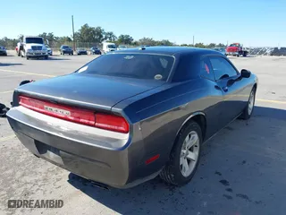 2013 Dodge Challenger Rallye Redline with VIN 2C3CDYAG8DH578929, listed as a IAAI auction lot 41479265 with 138,098 mi miles. Bid and sale history available at carsss.com. Image 4.