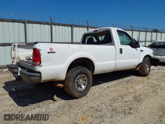 1999 Ford Super Duty F-250 XL with VIN 1FTNF20L3XEC76809, listed as a IAAI auction lot 40153294 with 457,050 mi miles. Bid and sale history available at carsss.com. Image 4.