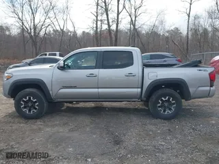 2019 Toyota Tacoma 4WD SR with VIN 5TFCZ5AN8KX168893, listed as a IAAI auction lot 41823745 with 146,557 mi miles. Bid and sale history available at carsss.com. Image 14.
