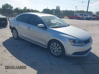 2012 Volkswagen Jetta SE z VIN 3VWDP7AJ9CM313060, wystawiony jako IAAI lot #42182183 z przebiegiem 123 291 mil mil oraz . Historia ofert i sprzedaży dostępna na DreamBid. Obrazek 1.