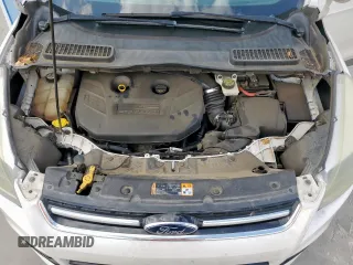 2013 Ford Escape Titanium z VIN 1FMCU0J90DUC13426, wystawiony jako Copart lot #53643565 z przebiegiem 176 600 mil mil oraz Szkoda całkowita • Salvage title. Historia ofert i sprzedaży dostępna na DreamBid. Obrazek 12.