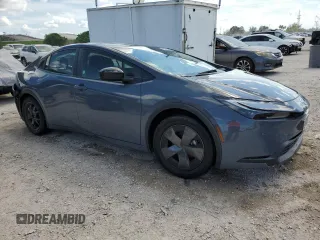 2024 Toyota Prius LE with VIN JTDACAAUXR3023011, listed as a Copart auction lot 61337595 with 25,660 mi miles and Non repairable. Bid and sale history available at DreamBid. Image 4.
