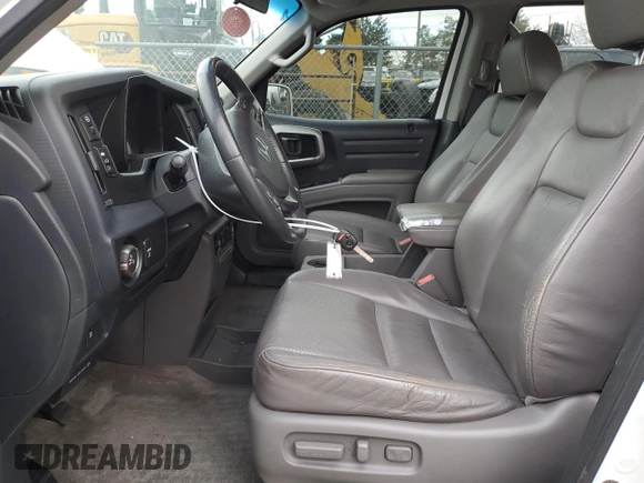 2010 Honda Ridgeline RTL with VIN 5FPYK1F58AB005088, listed as a Copart auction lot 47477975 with 128,538 mi miles and Salvage Title. Bid and sale history available at carsss.com. Image 7.