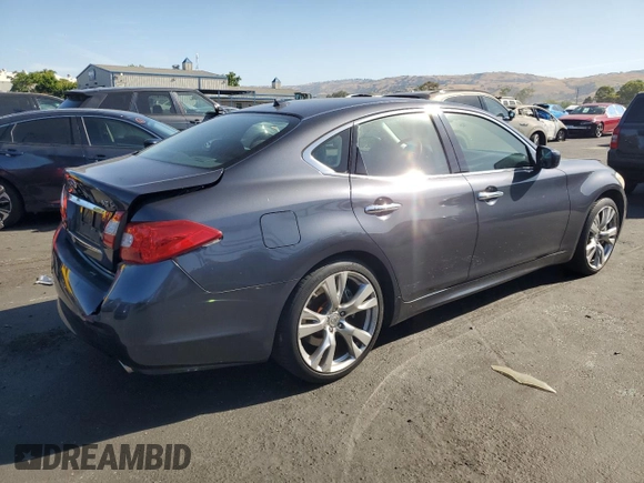 2011 Infiniti M with VIN JN1BY1AP3BM325629, listed as a Copart auction lot 58600135 with 132,635 mi miles and Salvage title. Bid and sale history available at DreamBid. Image 3.