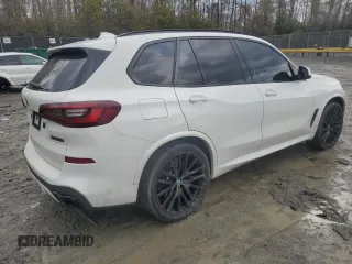 2020 BMW X5 M50i with VIN 5UXJU4C02L9C46464, listed as a Copart auction lot 43455805 with 89,337 mi miles and Salvage Title. Bid and sale history available at DreamBid. Image 3.