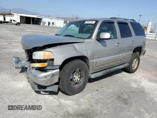 2001 GMC Yukon SLE z VIN 1GKEC13T51R191165, wystawiony jako Copart lot #59907285 z przebiegiem 252 361 mil mil oraz Szkoda całkowita • Salvage title. Historia ofert i sprzedaży dostępna na DreamBid. Obrazek 1.