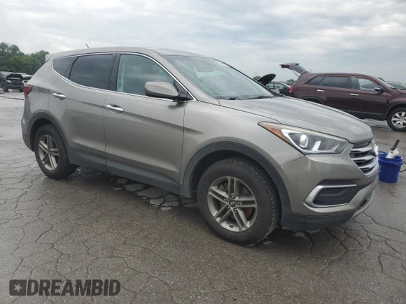 2018 Hyundai Santa Fe 2.4L z VIN 5NMZTDLB7JH098559, wystawiony jako Copart lot #56868005 z przebiegiem 197 233 mil mil oraz Czysty tytuł • Clean title. Historia ofert i sprzedaży dostępna na DreamBid. Obrazek 4.