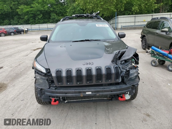 2014 Jeep Cherokee Trailhawk z VIN 1C4PJMBS9EW159721, wystawiony jako Copart lot #60719525 z przebiegiem 136 807 mil mil oraz Szkoda całkowita • Salvage title. Historia ofert i sprzedaży dostępna na DreamBid. Obrazek 5.