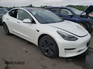 2023 Tesla Model 3 with VIN 5YJ3E1EA6PF563331, listed as a Copart auction lot 61124715 with 26,198 mi miles and Salvage title. Bid and sale history available at DreamBid. Image 4.