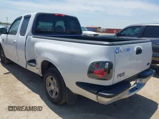1999 Ford F-150 with VIN 1FTRX07W0XKA01385, listed as a IAAI auction lot 42247809 with 147,105 mi miles and . Bid and sale history available at DreamBid. Image 3.