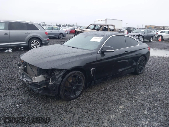 2015 BMW 4 Series 428i xDrive with VIN WBA3N5C56FK197981, listed as a IAAI auction lot 41145927 with 101,944 mi miles and . Bid and sale history available at DreamBid. Image 2.