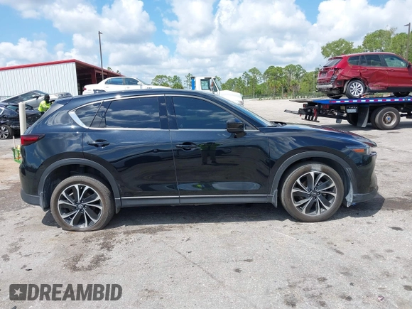 2023 Mazda CX-5 2.5 S Premium Plus Package with VIN JM3KFBEM5P0256652, listed as a IAAI auction lot 41936376 with 31,332 mi miles. Bid and sale history available at carsss.com. Image 13.