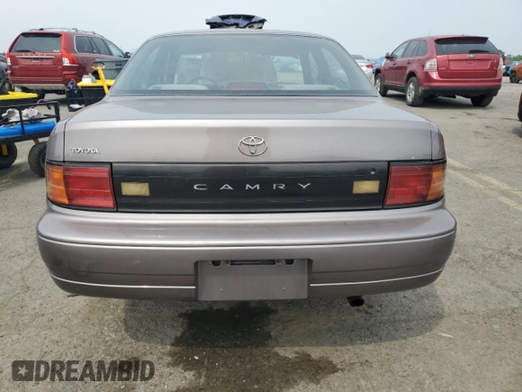 1992 Toyota Camry с VIN 4T1SK11E8NU009222, выставлен на аукционе Copart как лот 60811625 с пробегом 143 925 миль миль и Чистый • Clean title. История ставок и продаж доступна на DreamBid. Изображение 6.
