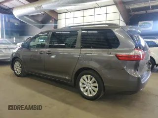 2015 Toyota Sienna LE with VIN 5TDJK3DC7FS105502, listed as a Copart auction lot 61672045 with 183,035 mi miles and Clean title. Bid and sale history available at DreamBid. Image 2.