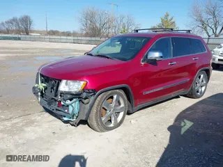 2012 Jeep Grand Cherokee Overland with VIN 1C4RJFCTXCC166770, listed as a IAAI auction lot 41833086 with 175,656 mi miles. Bid and sale history available at carsss.com. Image 2.
