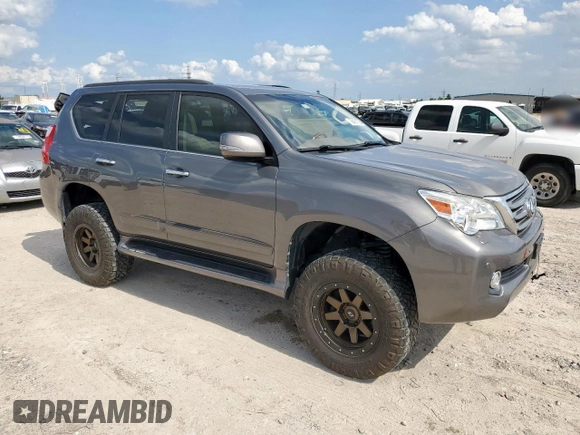 2012 Lexus GX 460 Premium with VIN JTJJM7FX2C5040932, listed as a Copart auction lot 58431725 with 130,995 mi miles and Salvage title. Bid and sale history available at DreamBid. Image 4.