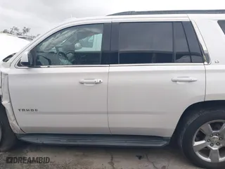 2018 Chevrolet Tahoe LT with VIN 1GNSKBKC7JR351112, listed as a IAAI auction lot 41732631 with 103,771 mi miles. Bid and sale history available at carsss.com. Image 14.