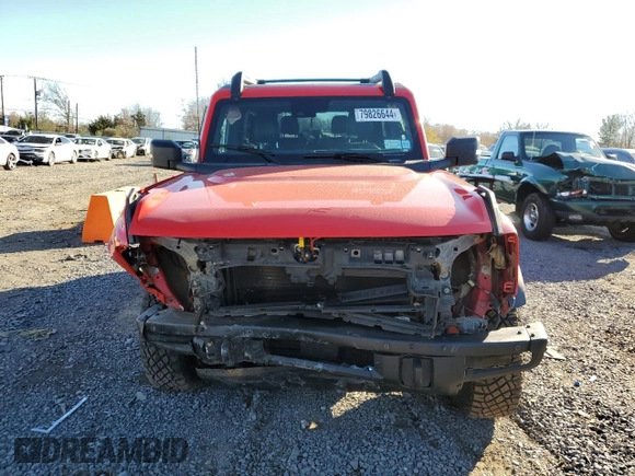 2021 Ford Bronco z VIN 1FMDE5CH3MLA60288, wystawiony jako Copart lot #79826644 z przebiegiem 12 451 mil mil oraz Szkoda całkowita • Salvage title. Historia ofert i sprzedaży dostępna na DreamBid. Obrazek 5.