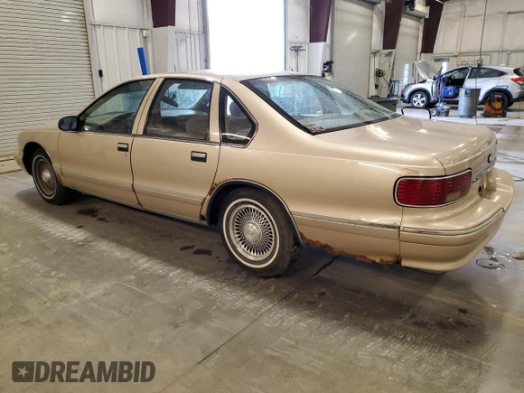 1996 Chevrolet Caprice 1SA Special Value z VIN 1G1BL52W2TR126674, wystawiony jako Copart lot #59387525 z przebiegiem Nie podano mil oraz Czysty tytuł • Clean title. Historia ofert i sprzedaży dostępna na DreamBid. Obrazek 2.