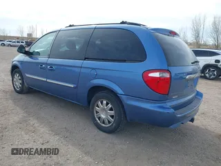 2007 Chrysler Town & Country Touring z VIN 2A4GP54L17R125711, wystawiony jako IAAI lot #41865946 z przebiegiem 169 558 mil mil oraz . Historia ofert i sprzedaży dostępna na DreamBid. Obrazek 3.