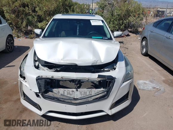 2015 Cadillac CTS with VIN 1G6AP5SX7F0139285, listed as a IAAI auction lot 41999355 with 34,709 mi miles and . Bid and sale history available at DreamBid. Image 12.
