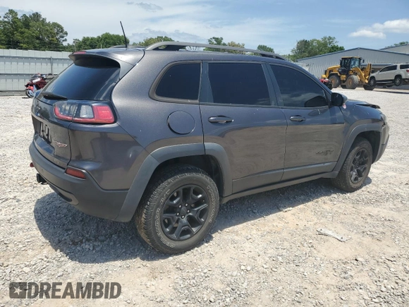 2019 Jeep Cherokee Trailhawk с VIN 1C4PJMBX5KD278692, выставлен на аукционе Copart как лот 56912285 с пробегом 110 964 миль миль и Списание • Salvage title. История ставок и продаж доступна на DreamBid. Изображение 3.