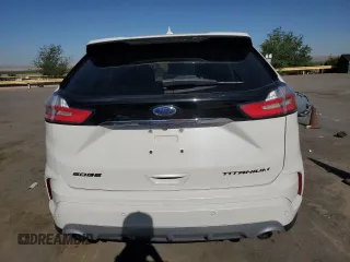 2019 Ford Edge Titanium z VIN 2FMPK3K99KBC62750, wystawiony jako Copart lot #57854045 z przebiegiem 57 327 mil mil oraz Szkoda całkowita • Salvage title. Historia ofert i sprzedaży dostępna na DreamBid. Obrazek 6.