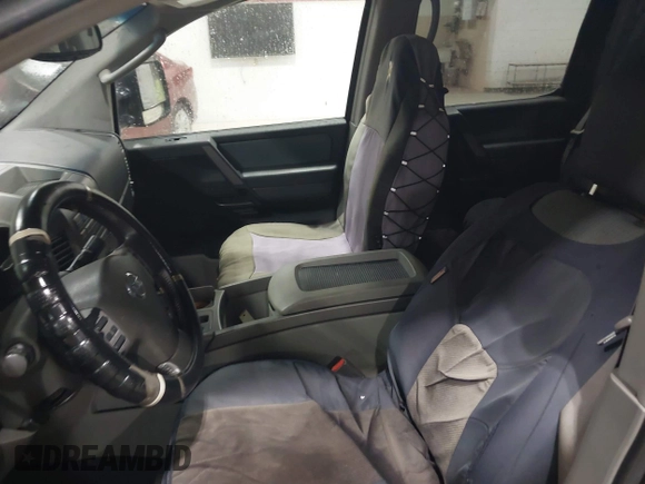 2004 Nissan Titan LE with VIN 1N6AA07B84N544745, listed as a IAAI auction lot 42195072 with 357,986 mi miles. Bid and sale history available at carsss.com. Image 8.