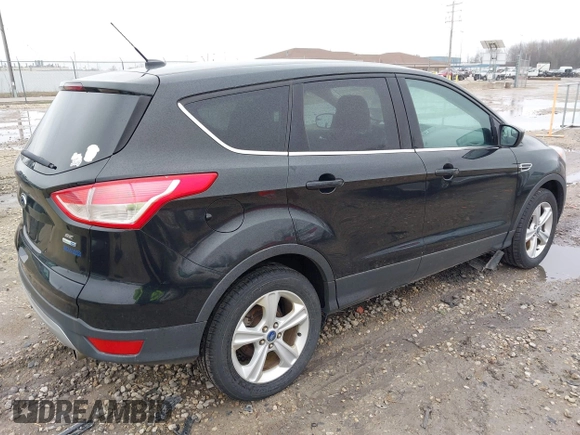 2013 Ford Escape SE with VIN 1FMCU9G94DUA21681, listed as a IAAI auction lot 42057896 with 197,257 mi miles. Bid and sale history available at carsss.com. Image 4.