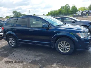 2013 Dodge Journey SXT z VIN 3C4PDDBG0DT614818, wystawiony jako IAAI lot #42270643 z przebiegiem 151 207 mil mil oraz . Historia ofert i sprzedaży dostępna na DreamBid. Obrazek 13.