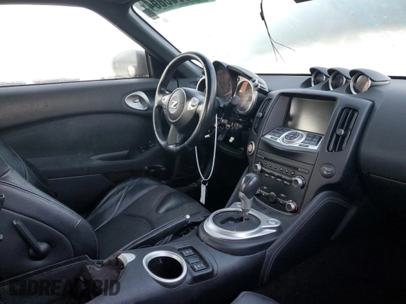 2013 Nissan 370Z with VIN JN1AZ4EH6DM381807, listed as a Copart auction lot 79241394 with Not Provided miles and Salvage Title. Bid and sale history available at carsss.com. Image 8.