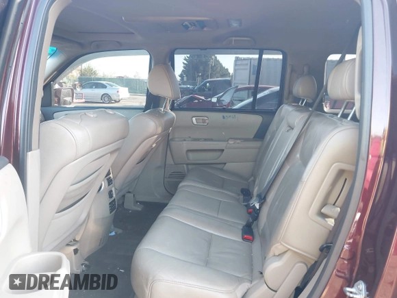 2011 Honda Pilot Touring z VIN 5FNYF4H9XBB040893, wystawiony jako IAAI lot #41933530 z przebiegiem 161 725 mil mil oraz . Historia ofert i sprzedaży dostępna na DreamBid. Obrazek 8.