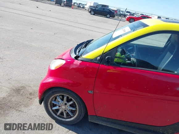 2009 Smart fortwo Pure z VIN WMEEJ31X99K290533, wystawiony jako IAAI lot #42198999 z przebiegiem 50 608 mil mil oraz . Historia ofert i sprzedaży dostępna na DreamBid. Obrazek 12.
