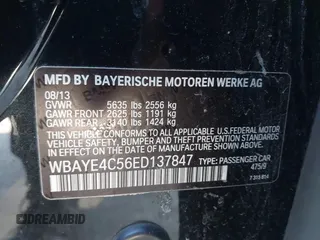 2014 BMW 7 Series 740Li with VIN WBAYE4C56ED137847, listed as a IAAI auction lot 39452255 with 184,471 mi miles. Bid and sale history available at carsss.com. Image 9.