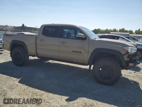 2020 Toyota Tacoma SR5 with VIN 3TMDZ5BN3LM087312, listed as a Copart auction lot 57876405 with 49,201 mi miles and Salvage title. Bid and sale history available at DreamBid. Image 4.