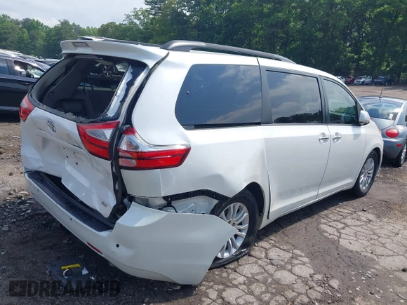 2015 Toyota Sienna XLE with VIN 5TDYK3DC5FS613045, listed as a IAAI auction lot 42276147 with 108,271 mi miles and . Bid and sale history available at DreamBid. Image 4.