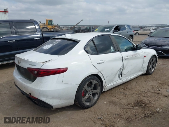 2017 Alfa Romeo Giulia with VIN ZARFAEBN3H7535202, listed as a IAAI auction lot 41494009 with 90,071 mi miles. Bid and sale history available at carsss.com. Image 4.