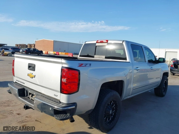 2015 Chevrolet Silverado 1500 LTZ with VIN 3GCUKSEC3FG338376, listed as a IAAI auction lot 42007176 with 145,472 mi miles. Bid and sale history available at carsss.com. Image 4.