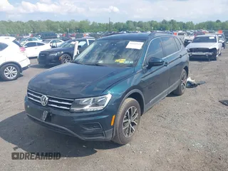 2018 Volkswagen Tiguan SEL z VIN 3VV2B7AX0JM047200, wystawiony jako IAAI lot #42221523 z przebiegiem 108 753 mil mil oraz . Historia ofert i sprzedaży dostępna na DreamBid. Obrazek 17.